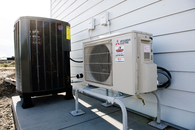 Heat Pump & Ducted Mini-split Unit installed outside of a residential test home